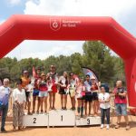 Podi amb els guanyadors en les diferents categories de la prova